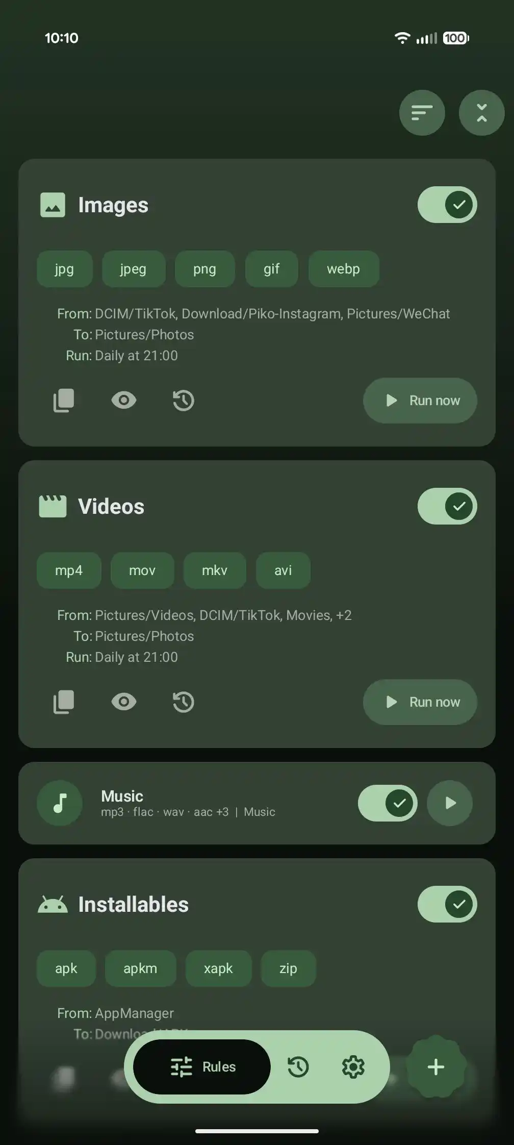 Rule cards show source folders, active filters, schedule, and run controls.